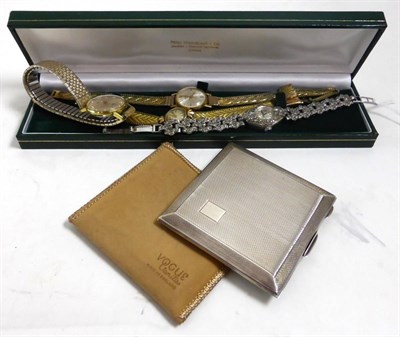 Lot 225 - A silver compact, a lady's marcasite set watch and three lady's wristwatches