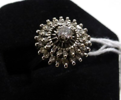 Lot 234 - An 18ct white gold diamond cluster ring