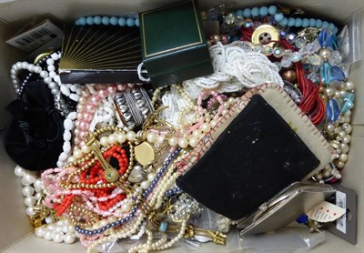 Lot 243 - A large quantity of assorted costume jewellery including necklaces, brooches, silver compact...