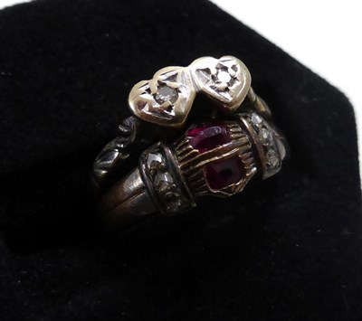 Lot 246 - A ruby and diamond ring, stamped '18C', and a diamond two stone ring, stamped '18CT' and 'PLAT' (2)