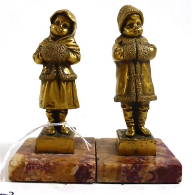 Lot 263 - A pair of gilt bronze figures of Russian children