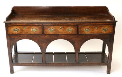 Lot 841 - A George III Oak Dresser of Small Proportions, late 18th century, the later three-quarter...