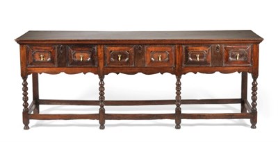 Lot 843 - A Late 17th Century Oak Dresser, the rectangular top above three two-as-one geometric moulded...