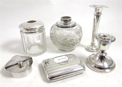 Lot 320 - A silver cigarette case, silver loaded spill vase, silver loaded candlestick, etc