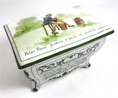 Lot 325 - A Royal Doulton lidded box in the form of a chest of drawers decorated with the nursery rhyme Peter