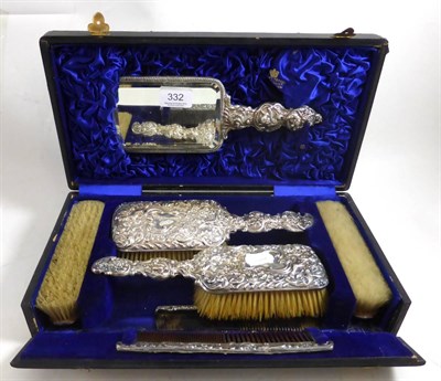 Lot 332 - A Victorian silver backed dressing table set, in a fitted case