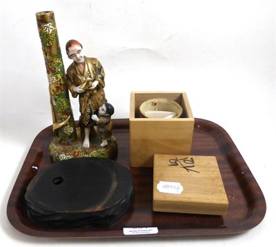 Lot 334 - A Japanese group of two figures on a wooden base and a brush pot