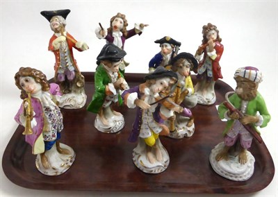 Lot 338 - A nine piece monkey band, 19th century and later