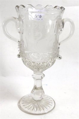 Lot 339 - A glass celery vase etched with a swan