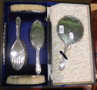 Lot 368 - A silver five piece dressing table set, in fitted case