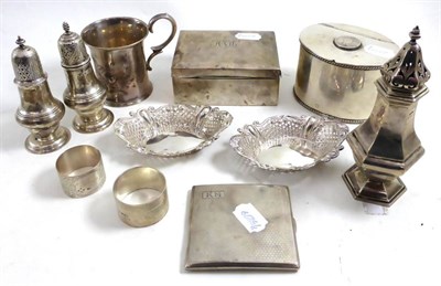 Lot 383 - A quantity of silver including a pair of pierced dishes, pepperettes, caster, cigarette case,...