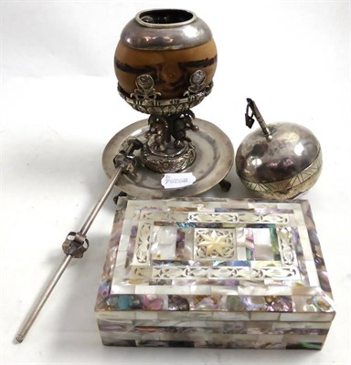 Lot 387 - A South American white metal mounted object on three feet, a South American silver straw, a...