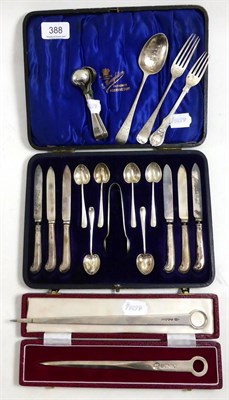 Lot 388 - A group of silver flatware including cased pistol grip fruit knives and coffee spoons, salt...