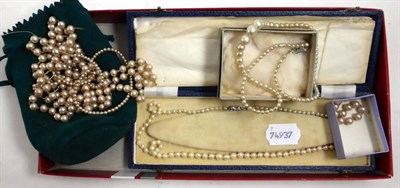 Lot 415 - A strand of cultured pearls and simulated pearls