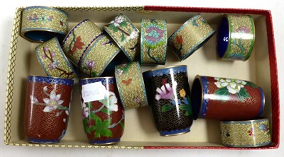 Lot 419 - A set of ten cloisonne napkin rings and four beakers (14)