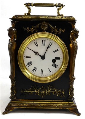 Lot 427 - An ebonised and gilt metal mounted mantel timepiece