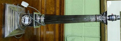 Lot 441 - A silver plated Corinthian table lamp (converted to electricity)