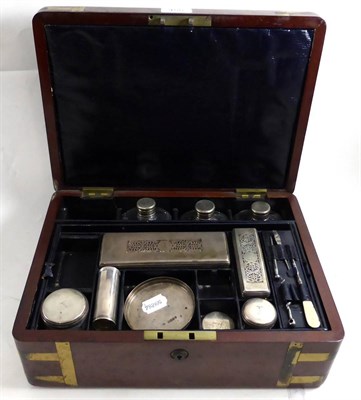 Lot 455 - An Edwardian gentleman's travelling grooming case with silver mounted fittings