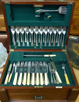 Lot 487 - A Mappin & Webb mahogany canteen containing a partial harlequin flatware service