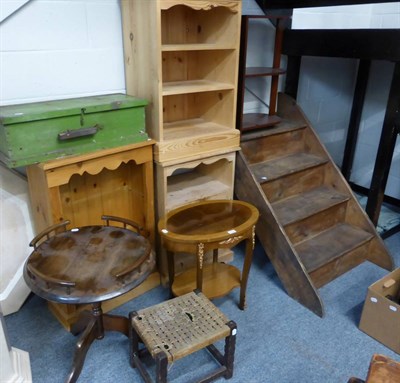 Lot 1012 - A pine open bookcase, a pine cupboard, a set of pine shelves, an occasional table, a set of...