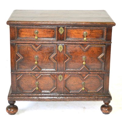 Lot 869 - A Late 17th Century Oak Straight Front Chest, with three two-as-one drawers with geometric moulding