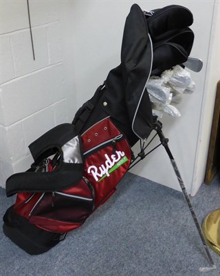 Lot 1019 - A quantity of golf clubs in a fabric case