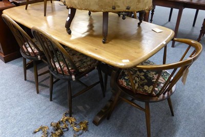 Lot 1020 - A modern dining table with six chairs