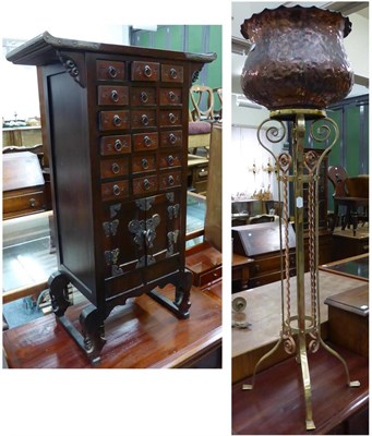 Lot 1023 - A Chinese collector's cabinet together with a copper jardiniere on stand