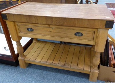 Lot 1024 - A substantial modern butchers block fitted with a drawer