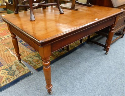 Lot 1031 - A Victorian fruitwood kitchen table on later ball casters