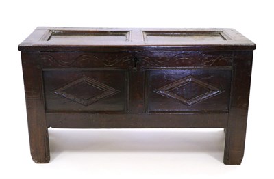 Lot 871 - A 17th Century Joined Oak Chest, the hinged lid with fielded panels above a carved frieze with...