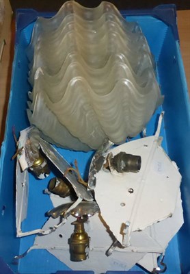 Lot 1045 - Seven Art Deco shell pattern frosted glass wall lights, unmarked, in chrome brackets, shade...