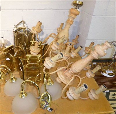 Lot 1058 - A group of modern light fittings including chandeliers, wall lights etc