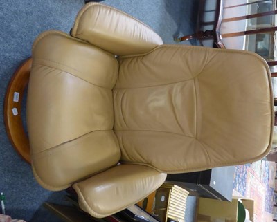 Lot 1067 - A Stressless armchair in tan leather