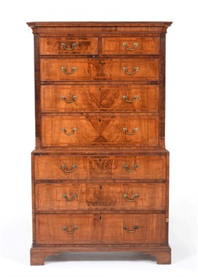 Lot 878 - A George II Walnut and Featherbanded Chest on Chest, mid 18th century, the cavetto cornice...