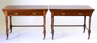 Lot 883 - A Pair of Victorian Walnut Writing Tables, stamped Shoolbred & Co, each with a red and gilt leather