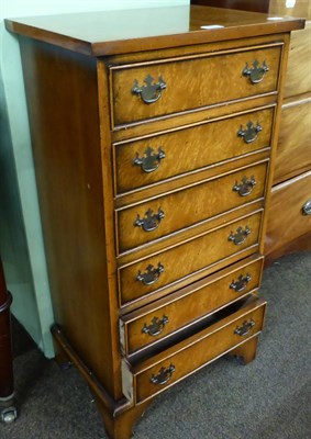 Lot 1210 - A six height chest of drawers of small proportions