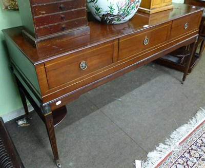 Lot 1214 - A mahogany square piano converted into a dressing table, on reeded tapering legs