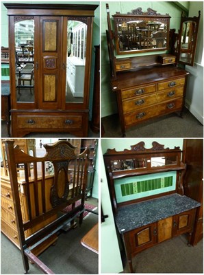 Lot 1221 - An early 20th century Art Nouveau four piece bedroom suite comprising of a double bed, a mirror...