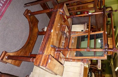 Lot 1232 - An early 19th century mahogany dressing table, an associated mirror and a towel rail