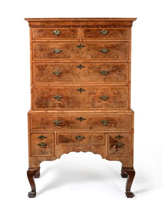 Lot 892 - A George II Walnut and Featherbanded Chest on Stand, circa 1750, the cavetto cornice above two...