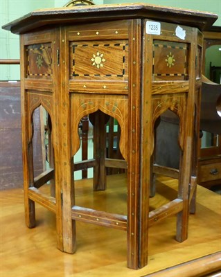 Lot 1235 - An 19th century Indian brass and ebony inlaid side table