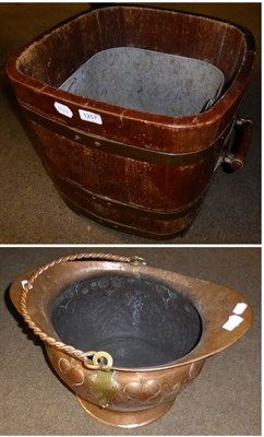 Lot 1257 - A brass bound rectangular two handled log bin and a copper coal scuttle with twisted swing...