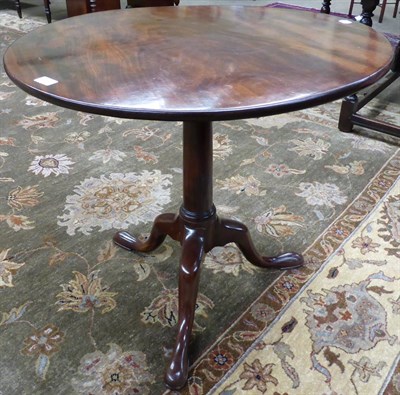 Lot 1260 - A mahogany flip top tripod table