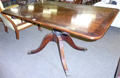 Lot 1265 - A mahogany flip top dining table