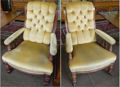 Lot 1270 - A pair of Victorian gold Draylon button back mahogany armchairs