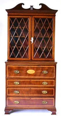 Lot 898 - A George III Mahogany and Satinwood Banded Secretaire Bookcase, early 19th century, the swan...