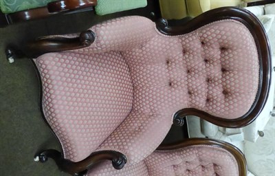 Lot 1276 - Victorian button back armchair upholstered in pink, on casters