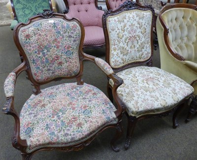 Lot 1278 - Late 19th century carved walnut fauteuil in Rococo style and a carved side chair