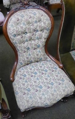 Lot 1280 - A Victorian walnut nursing chair